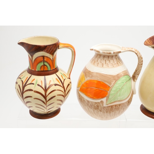 616 - VARIOUS MYOTT ART DECO JUGS. A variety of Myott Art Deco hand painted jugs, including a jug with a s... 