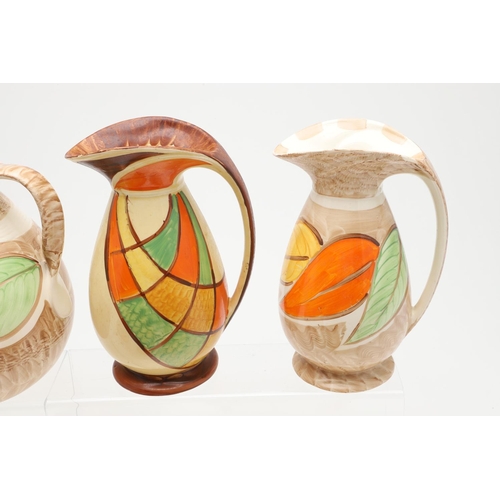 616 - VARIOUS MYOTT ART DECO JUGS. A variety of Myott Art Deco hand painted jugs, including a jug with a s... 