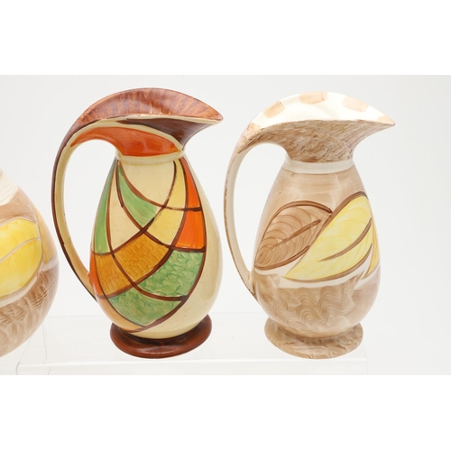 616 - VARIOUS MYOTT ART DECO JUGS. A variety of Myott Art Deco hand painted jugs, including a jug with a s... 