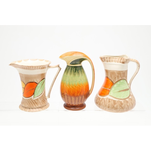 618 - VARIOUS MYOTT ART DECO JUGS. Seven various Myott jugs, each hand painted with a variety of floral de... 