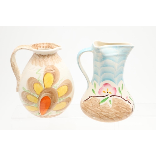 618 - VARIOUS MYOTT ART DECO JUGS. Seven various Myott jugs, each hand painted with a variety of floral de... 