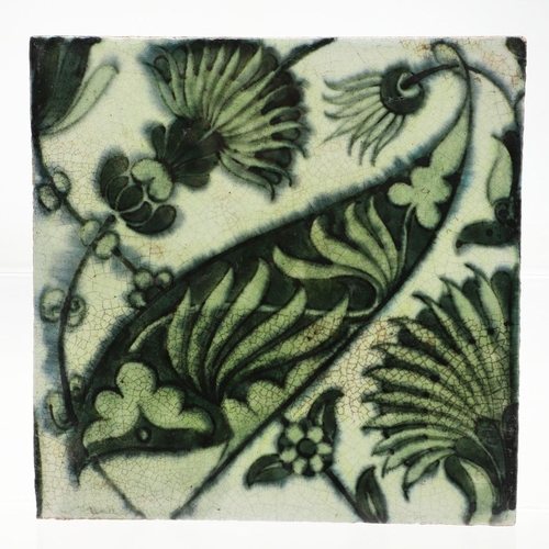 646 - WILLIAM DE MORGAN - TWO POTTERY TILES. Two floral designed square tiles, each with impressed marks t... 