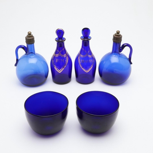 667 - 19THC RUM & BRANDY BLUE GLASS BOTTLES, & OTHER GLASSWARE. Two 19thc Rum and Brandy blue glass bottle... 