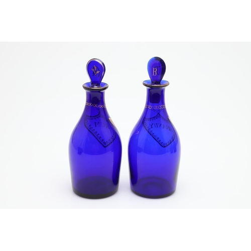 667 - 19THC RUM & BRANDY BLUE GLASS BOTTLES, & OTHER GLASSWARE. Two 19thc Rum and Brandy blue glass bottle... 