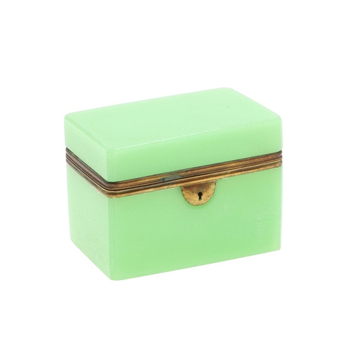 672 - ANTIQUE OPALINE GLASS CASKET. A rectangular shaped casket, with brass mounts around the rim and lock... 