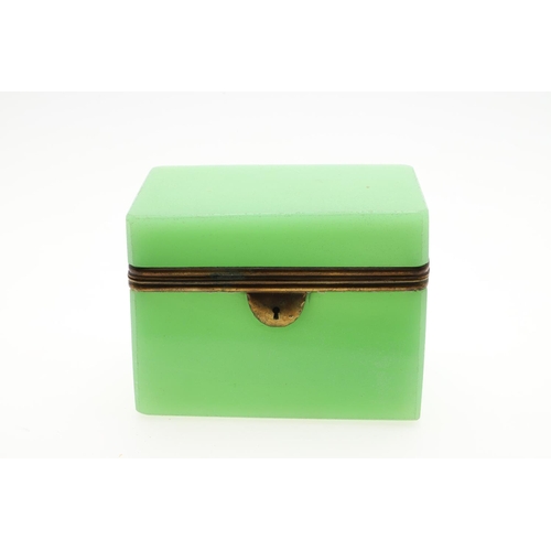 672 - ANTIQUE OPALINE GLASS CASKET. A rectangular shaped casket, with brass mounts around the rim and lock... 