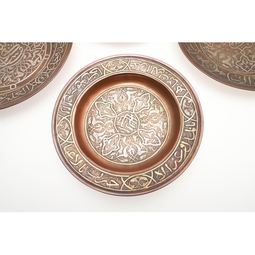 735 - SET OF PERSIAN COPPER & SILVER INLAID DISHES. Probably early 20thc, a set of six graduated copper di... 