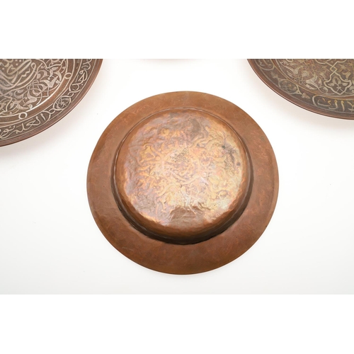 735 - SET OF PERSIAN COPPER & SILVER INLAID DISHES. Probably early 20thc, a set of six graduated copper di... 