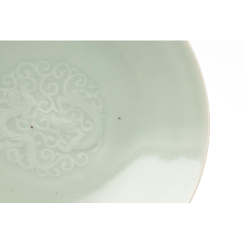 737 - 19THC CHINESE CELADON DISH. With a Qianlong seal mark but 19thc, with a short tapering foot and roun... 