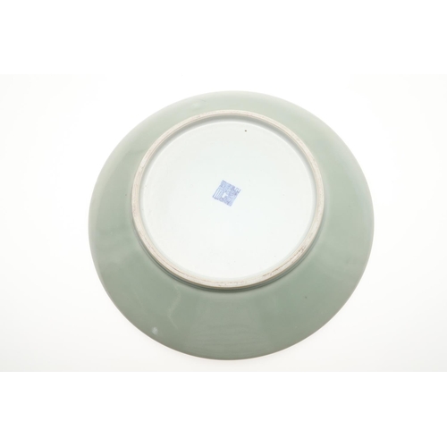 737 - 19THC CHINESE CELADON DISH. With a Qianlong seal mark but 19thc, with a short tapering foot and roun... 