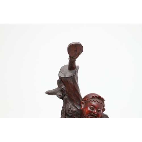 738 - CHINESE ROOT CARVED FIGURE - LIU HAI. Late Qing Dynasty, an unusual root carved figure of Liu Hai, w... 