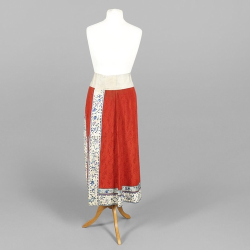 741 - ANTIQUE CHINESE SILK SKIRT. Probably late 19thc or early 20thc, the pleated red silk skirt with prin... 