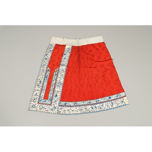 741 - ANTIQUE CHINESE SILK SKIRT. Probably late 19thc or early 20thc, the pleated red silk skirt with prin... 