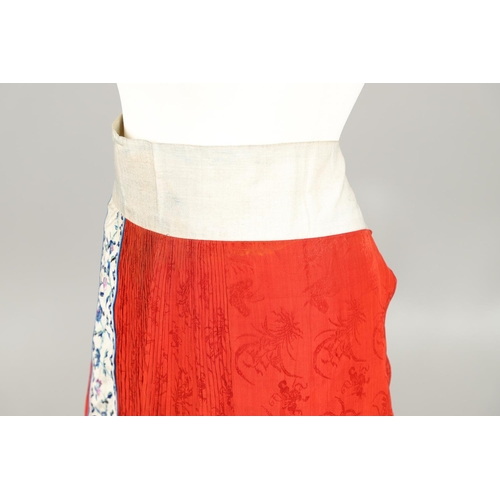 741 - ANTIQUE CHINESE SILK SKIRT. Probably late 19thc or early 20thc, the pleated red silk skirt with prin... 