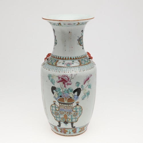 743 - 19THC CHINESE FAMILLE ROSE VASE. A large 19thc famille rose vase, painted to each side with jardinie... 