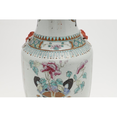 743 - 19THC CHINESE FAMILLE ROSE VASE. A large 19thc famille rose vase, painted to each side with jardinie... 