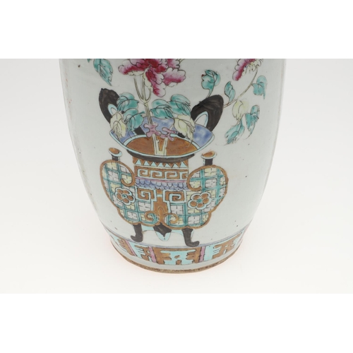 743 - 19THC CHINESE FAMILLE ROSE VASE. A large 19thc famille rose vase, painted to each side with jardinie... 