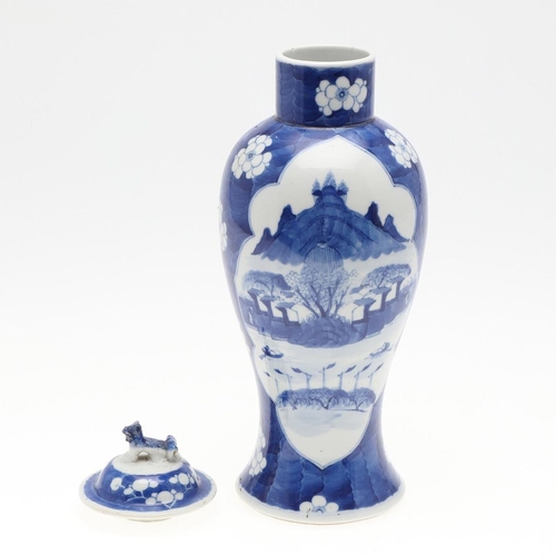 744 - 19THC CHINESE BLUE & WHITE VASE. A late 19thc blue and white vase of slender form, painted to each s... 