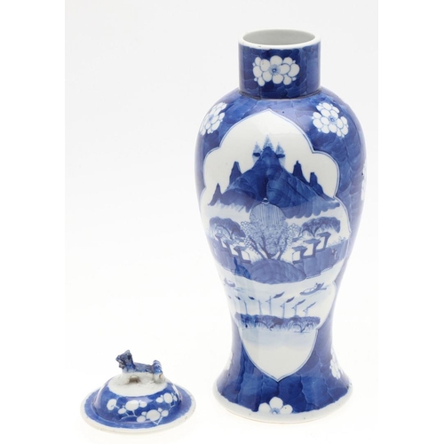 744 - 19THC CHINESE BLUE & WHITE VASE. A late 19thc blue and white vase of slender form, painted to each s... 