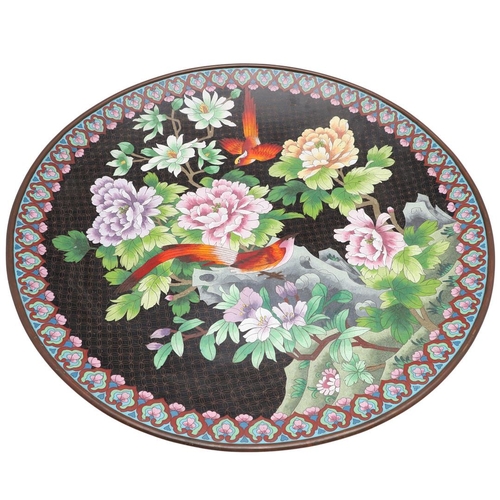 749 - LARGE CHINESE CLOISONNE CHARGER. An unusually large 20thc cloisonne charger, with exotic birds perch... 