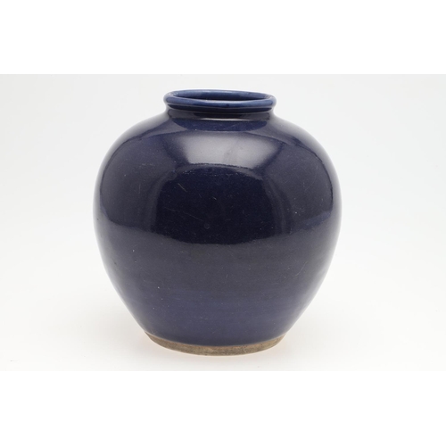 751 - 19THC CHINESE BLUE GLAZED VASE. A 19thc vase with rounded sides, with a plain dark blue glaze, the b... 