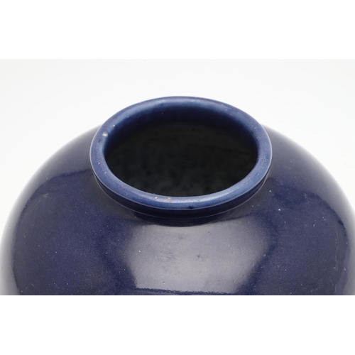 751 - 19THC CHINESE BLUE GLAZED VASE. A 19thc vase with rounded sides, with a plain dark blue glaze, the b... 