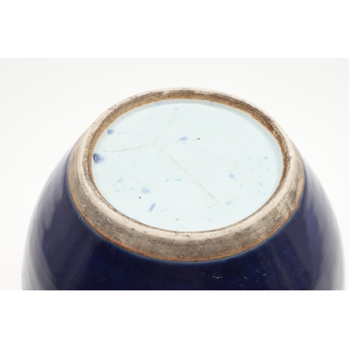 751 - 19THC CHINESE BLUE GLAZED VASE. A 19thc vase with rounded sides, with a plain dark blue glaze, the b... 