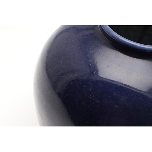 751 - 19THC CHINESE BLUE GLAZED VASE. A 19thc vase with rounded sides, with a plain dark blue glaze, the b... 