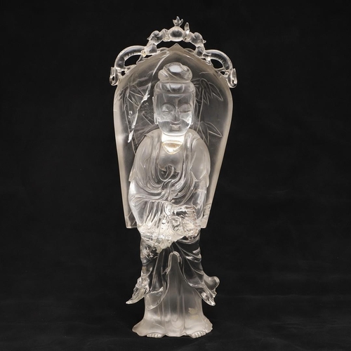 768 - CHINESE ROCK CRYSTAL CARVED FIGURE - GUANYIN. Late 19thc/early 20thc, a large carved rock crystal fi... 