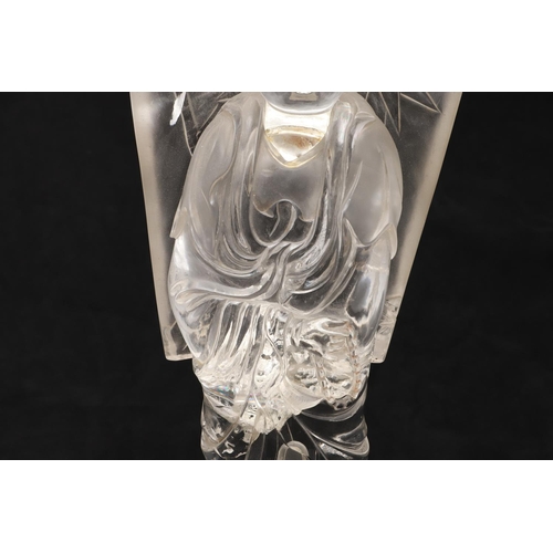 768 - CHINESE ROCK CRYSTAL CARVED FIGURE - GUANYIN. Late 19thc/early 20thc, a large carved rock crystal fi... 