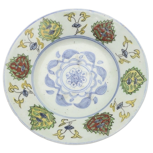 771 - KUTAHYA ISLAMIC DISH. Ottoman Turkey and probably 19thc, the centre painted with a central blue and ... 