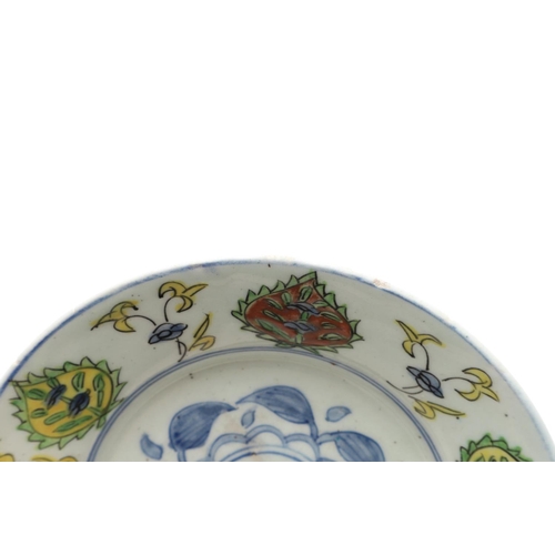 771 - KUTAHYA ISLAMIC DISH. Ottoman Turkey and probably 19thc, the centre painted with a central blue and ... 