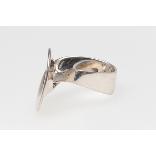 1000 - A SILVER RING BY GEORG JENSEN. design number 443, with maker's mark and stamped 925 S, 8.6 grams. Si... 