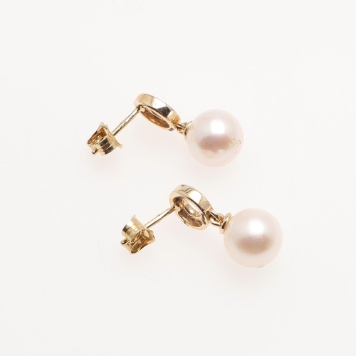 1010 - A PAIR OF CULTURED PEARL AND DIAMOND DROP EARRINGS. each earring mounted with a cultured pearl measu... 