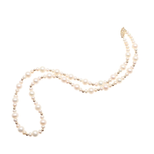 1011 - A CULTURED PEARL AND GOLD BEAD NECKLACE. mounted with cultured pearls measuring approximately 6.5mm,... 