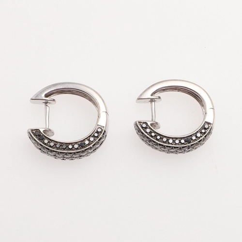 1012 - A PAIR OF DIAMOND HALF HOOP EARRINGS. each earring mounted with alternate rows of circular-cut black... 