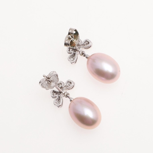 1016 - A PAIR OF CULTURED PEARL AND DIAMOND DROP EARRINGS. each earring mounted with a pink cultured pearl,... 