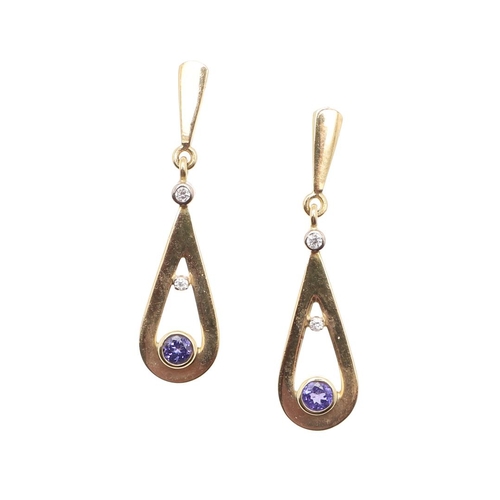 1028 - CATHERINE BEST. A PAIR OF TANZANITE DIAMOND AND 18CT GOLD DROP EARRINGS. each earring set with a cir... 