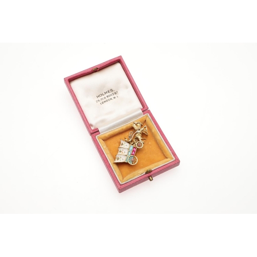 1035 - AN 18CT GOLD GEM SET AND ENAMEL HORSE AND CARRIAGE BROOCH. 4.5cm wide, 10.1 grams.