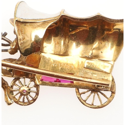 1035 - AN 18CT GOLD GEM SET AND ENAMEL HORSE AND CARRIAGE BROOCH. 4.5cm wide, 10.1 grams.