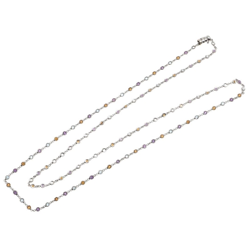 1039 - AN 18CT WHITE GOLD AND GEM SET SPECTACLE NECKLACE. collet set with assorted circular-cut gem stones,... 