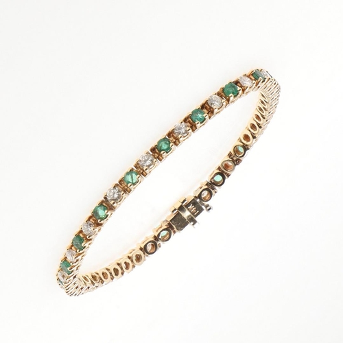 1045 - AN EMERALD AND DIAMOND BRACELET. mounted alternately with circular-cut emeralds and diamonds, in 14c... 