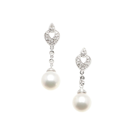 1046 - A PAIR OF CULTURED PEARL AND DIAMOND DROP EARRINGS. each earring set with an Akoya pearl measuring a... 