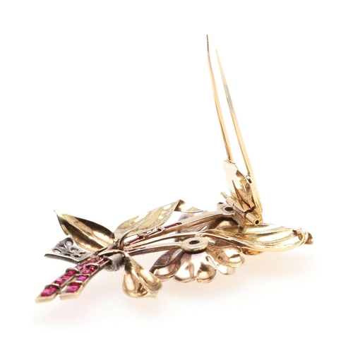 1051 - A RETRO GOLD, SYNTHETIC RUBY AND DIAMOND FOLIATE SPRAY BROOCH, CIRCA 1940. mounted with circular and... 