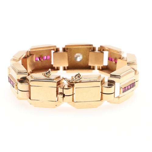 1052 - A RETRO GOLD, RUBY AND DIAMOND BRACELET, CIRCA 1940. formed with square ridged links, the central on... 