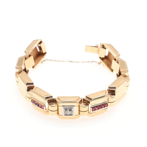 1052 - A RETRO GOLD, RUBY AND DIAMOND BRACELET, CIRCA 1940. formed with square ridged links, the central on... 