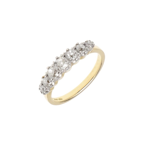 1060 - A DIAMOND HALF HOOP RING. mounted with seven circular old-cut diamonds, in 18ct gold, 5.2 grams. Siz... 