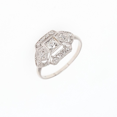 1064 - A DIAMOND CLUSTER RING. mounted overall with old-cut and single-cut diamonds, in platinum, 3.8 grams... 