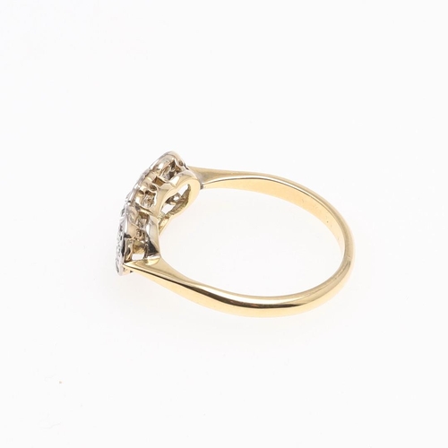 1068 - A DIAMOND TRIPLE CLUSTER RING. the three clusters millegrain set with old-cut diamonds, in 18ct gold... 