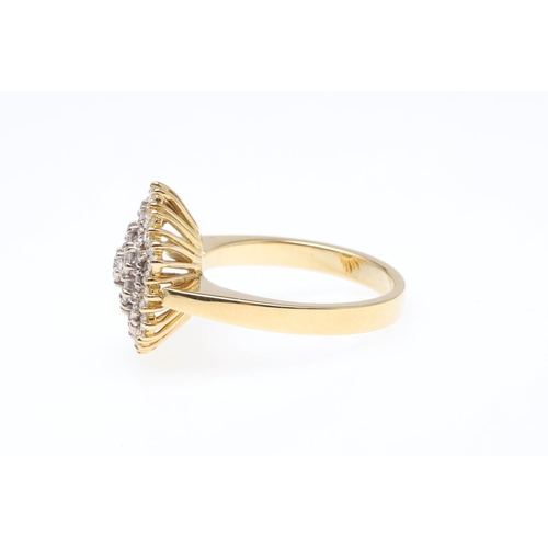 1070 - A DIAMOND CLUSTER RING. mounted with circular-cut diamonds, in 18ct yellow gold, 9.1 grams. Size T.